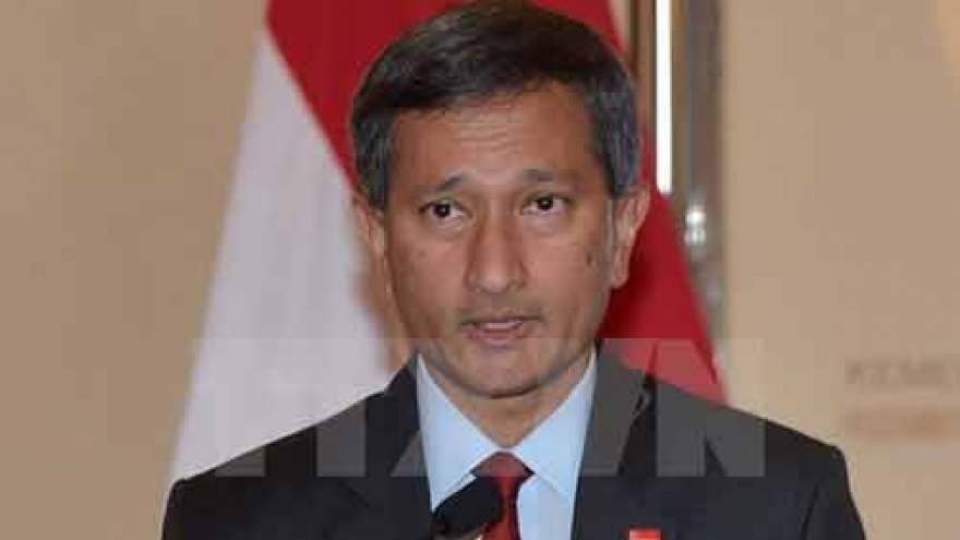 
        Singapore, China seek to reduce dispute risks in East Sea
                              