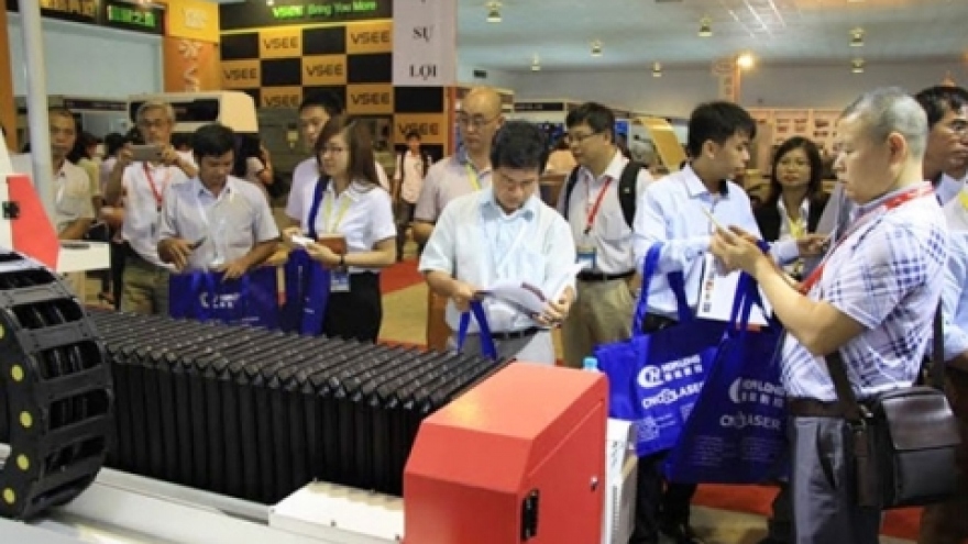 Three int’l industry expos open in Hanoi