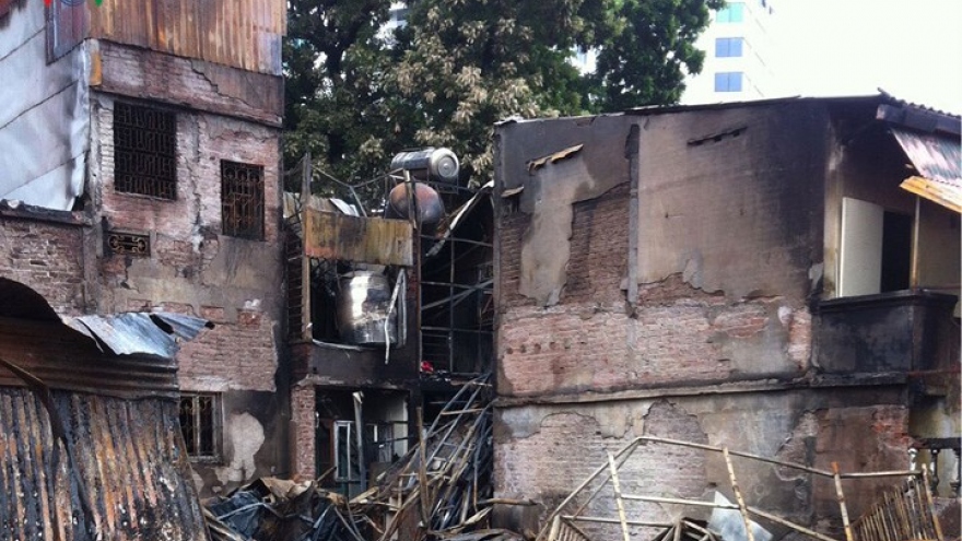 Devastating pictures as fire destroys Hanoi buildings