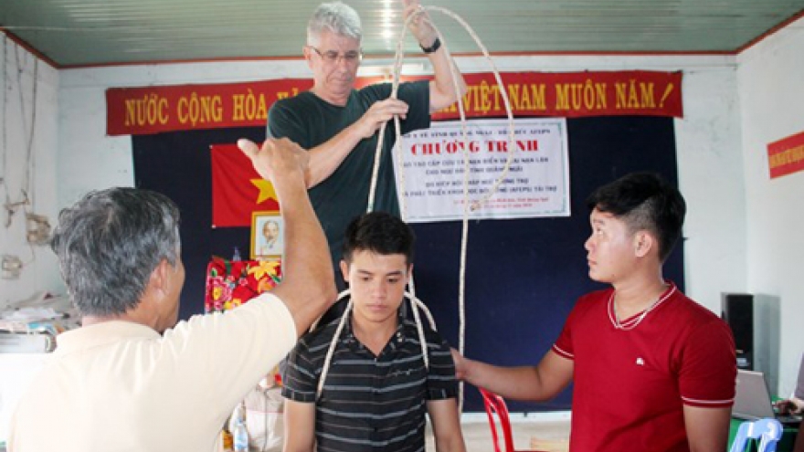 Fishermen equipped with scuba lifesaving
