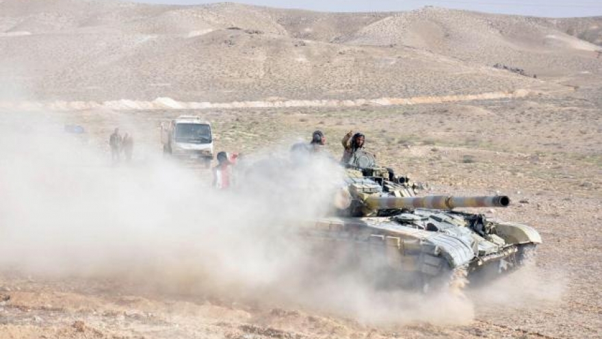 Islamic State under siege in Palmyra, militant leader killed