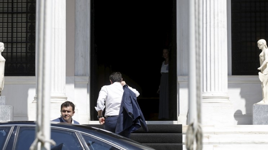 Greek faces tough conditions under deal with euro zone