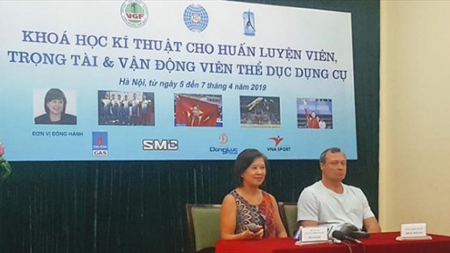 FIG Vice President Nellie Kim teaches Vietnamese gymnasts