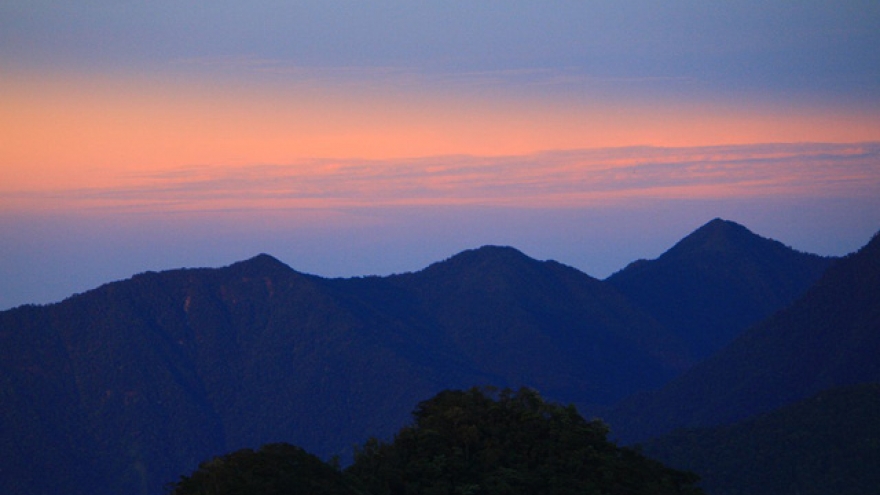 Stunning sunset on the Peak of Bach Ma Mountain