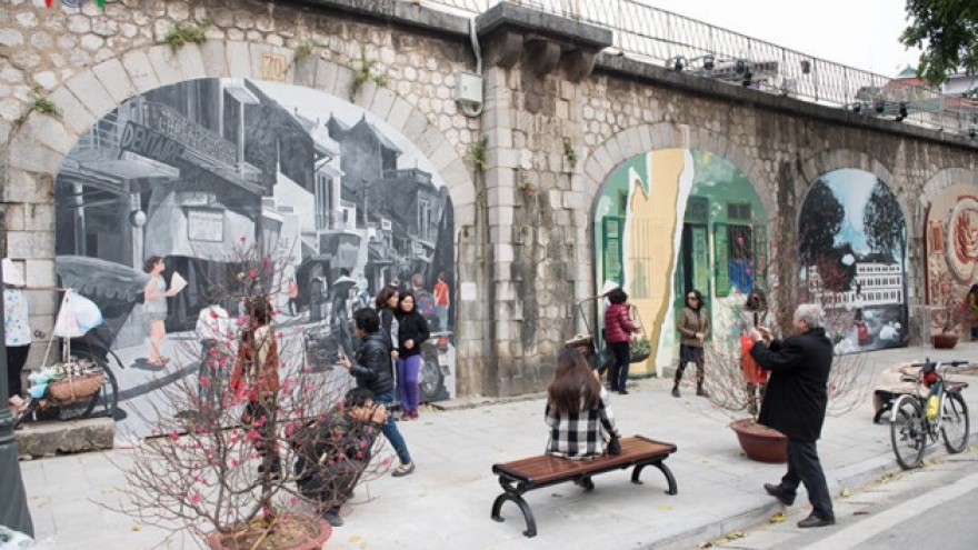 Phung Hung mural street features old Hanoi