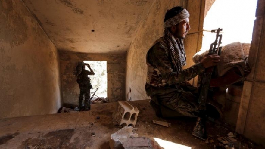 Kurds versus Syrian army battle intensifies, complicating multi-fronted war