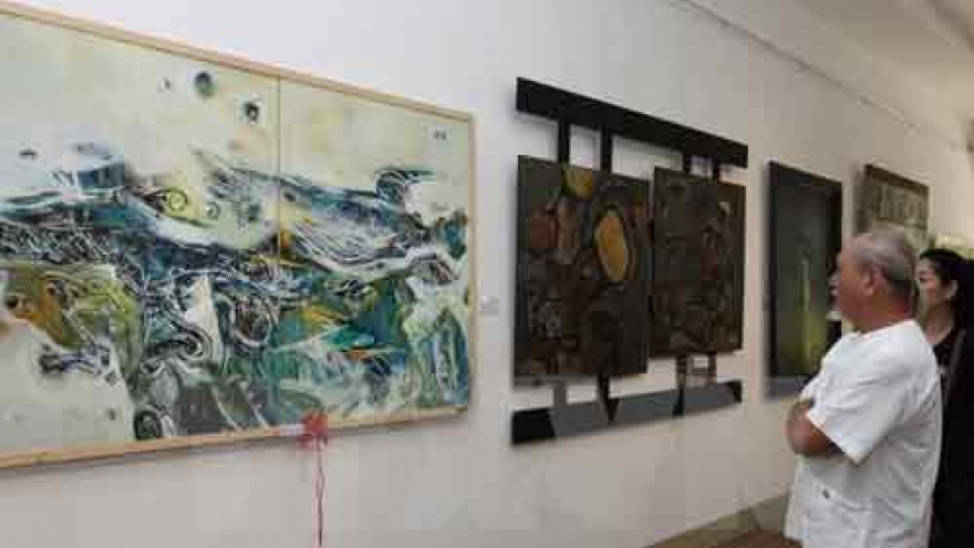 Traditional Vietnamese lacquer painting show in Hanoi