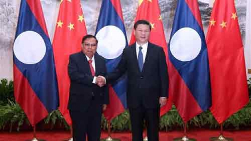 
        China, Laos enhance ties
                              