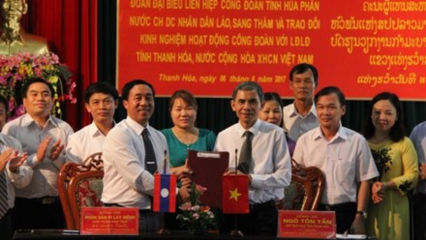 Vietnamese, Lao provinces share labour-related experience