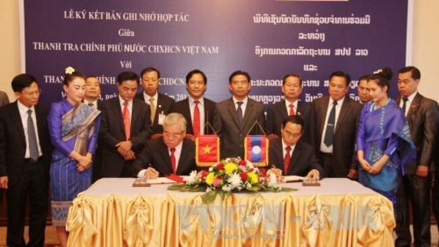 Vietnam, Laos boost cooperation in inspection work