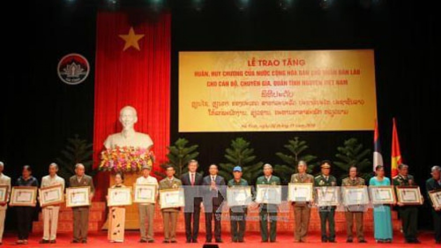 Laos honours Vietnamese voluntary soldiers, experts