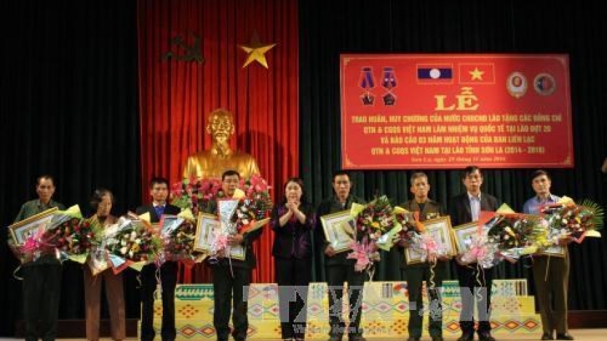 Lao decorations awarded to Vietnamese volunteer soldiers