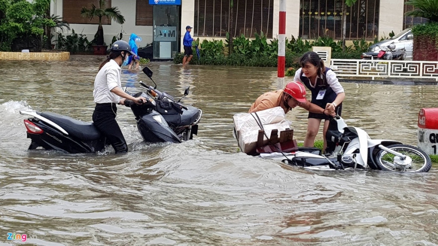 Tropical depression brings floods to northern, central provinces