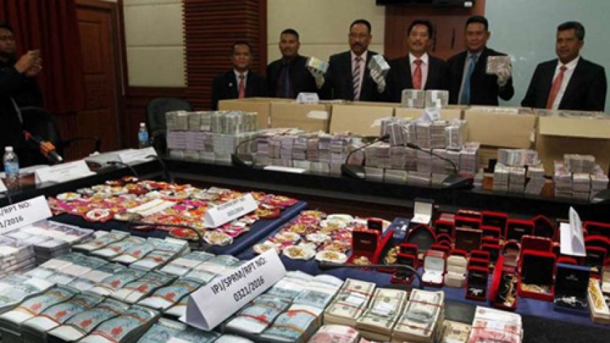 Malaysia seizes biggest-ever corruption cash