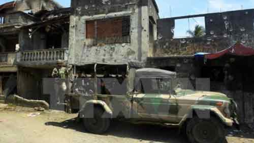 Abu Sayyaf threatens to behead Malaysian hostages