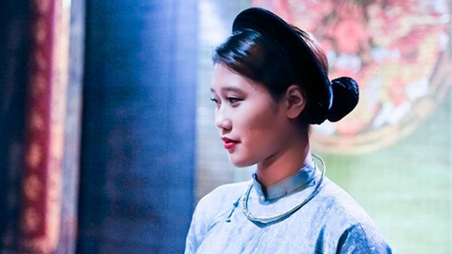 A Viet-Malaysian girl enthuses with Vietnamese “Ca tru” music