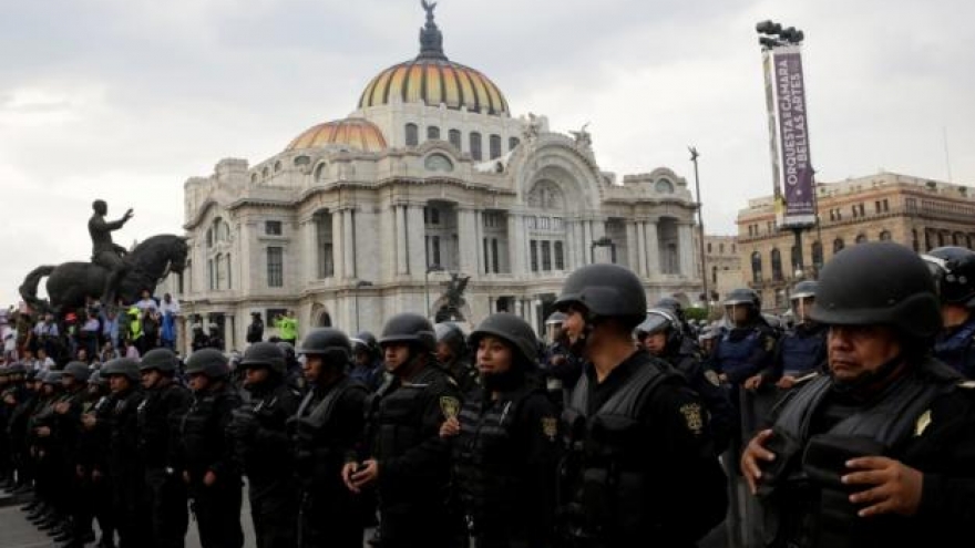 Three dead, 45 injured as labor union clashes with police in Mexico