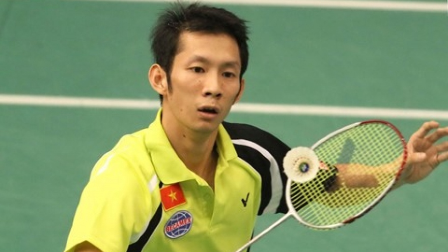 Minh knocked out of world badminton champs
