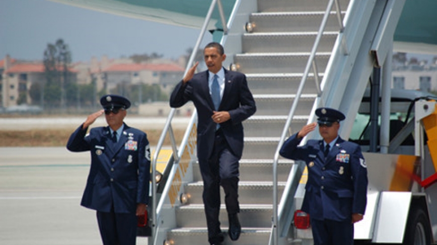 Trade, arms embargo confront President Obama in Vietnam