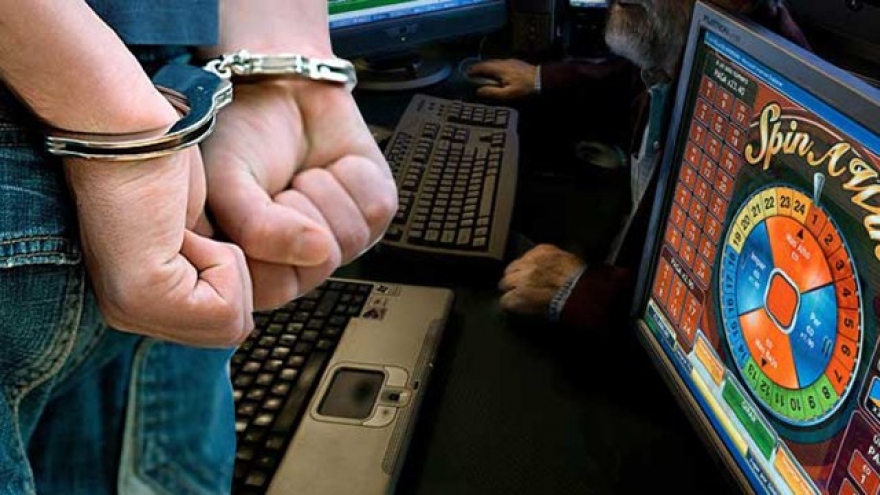 Vietnam courts sentence 64 members of online gambling ring