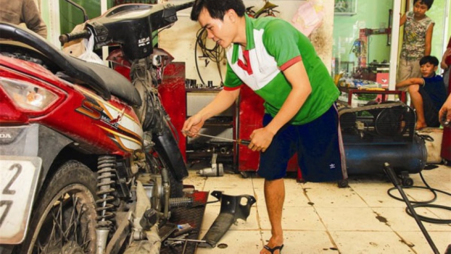 A kind-hearted motorbike service shop owner