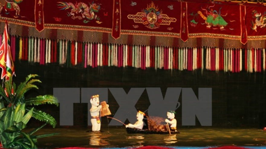 Water puppeteers perform in France