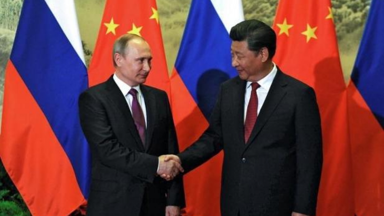 Russia secures energy deals, talks security with China as Putin visits