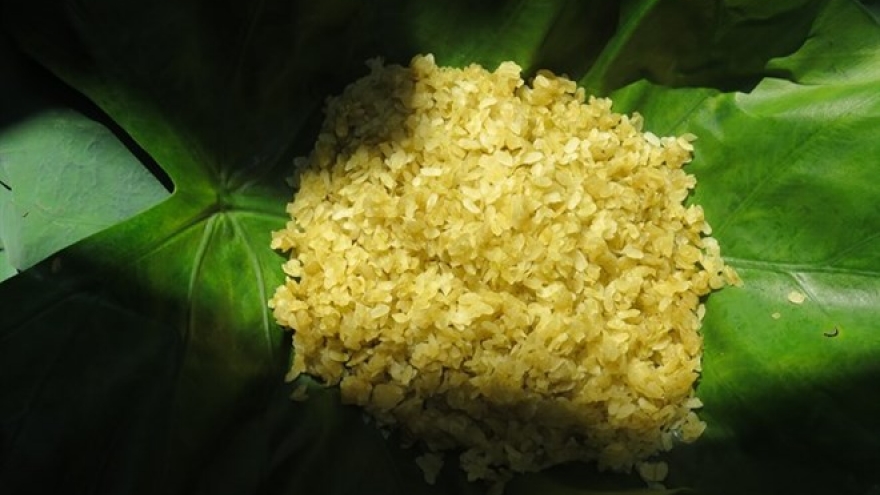 Hanoians fete young rice flakes