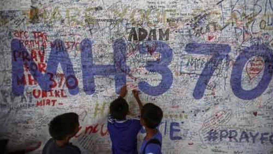 No answers in interim report on missing MH370