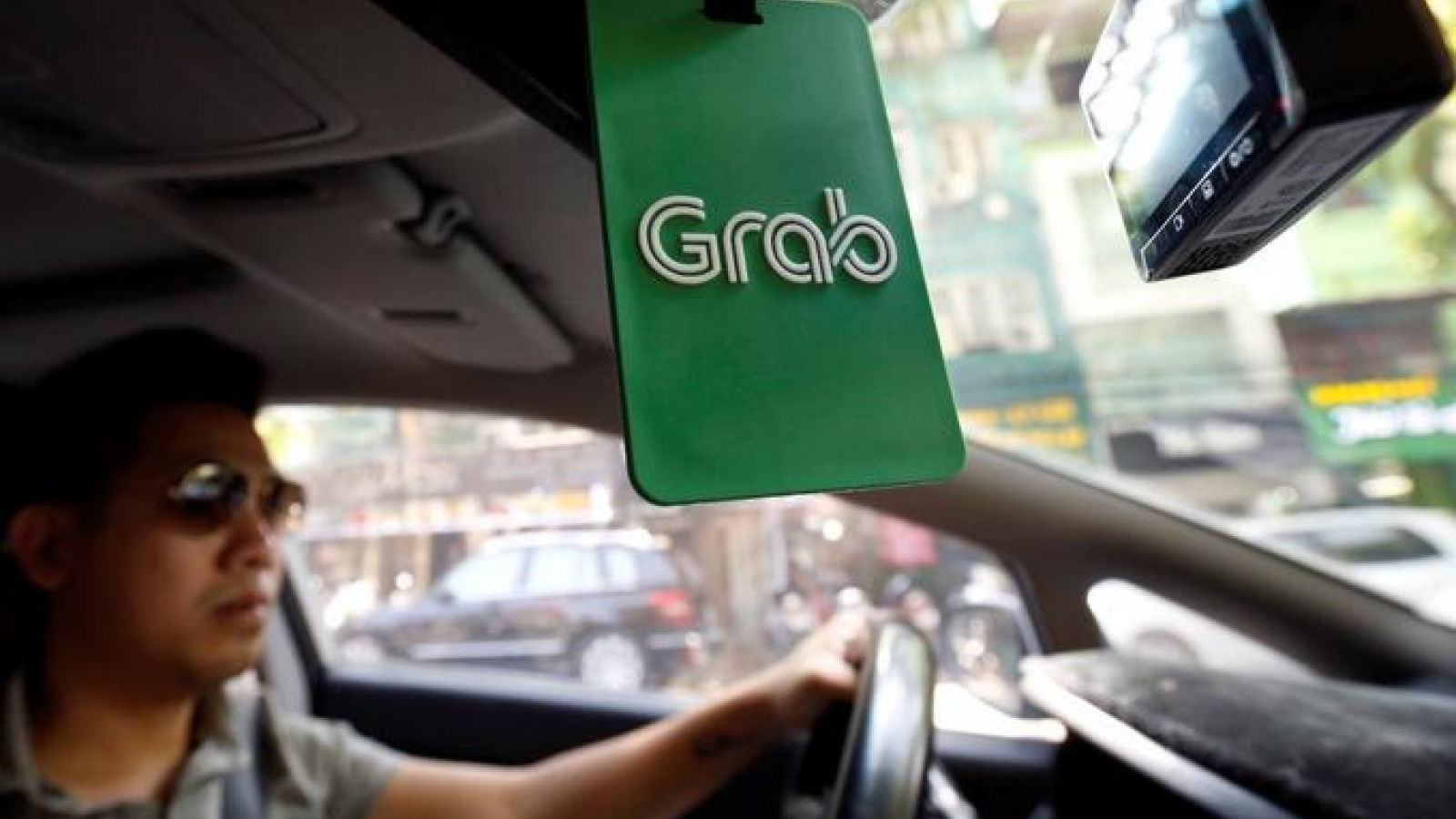 Vietnam court orders Grab to pay Vinasun US$208,000