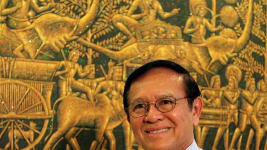 Cambodian King pardons opposition leader