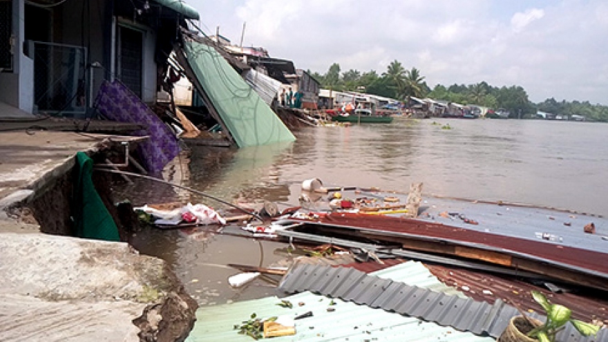 Erosion swallows five houses in Vietnam’s Mekong Delta