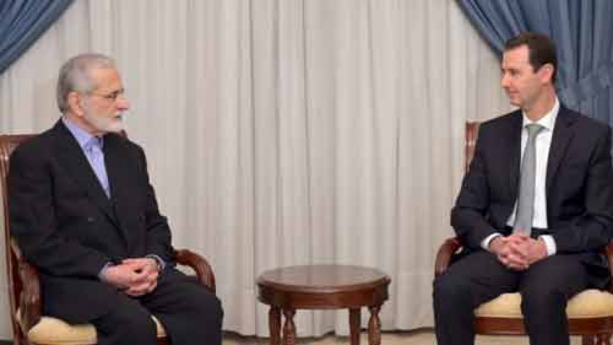
        Syria peace talks grind toward pivotal Assad question
                              