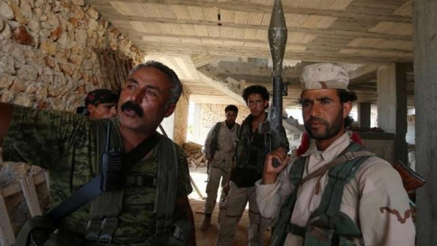 
        US-backed forces advance against Islamic State in Syria
                              