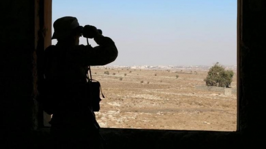 Syria rebels guardedly agree on truce but battles persist