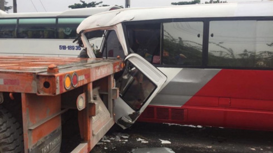 Semi-trailer rips side off tour bus on National Highway 1