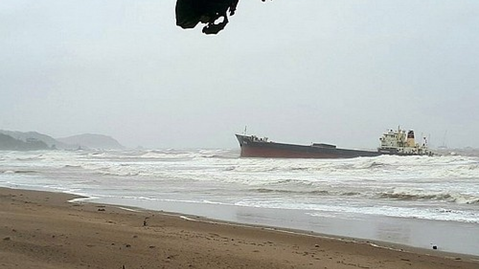 One dead, 5 missing as coal freighter overturned by storm Talas in central Vietnam