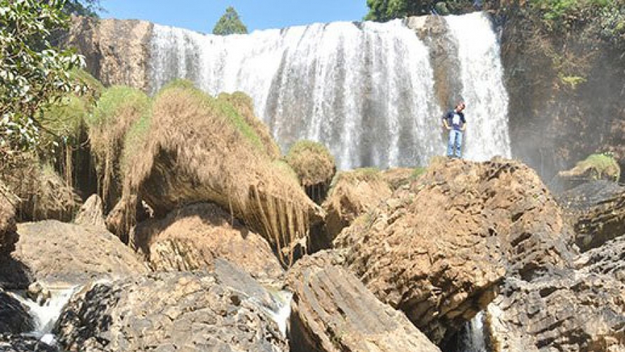 Conquering the foot of Voi Waterfall