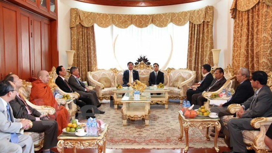 HCM City leader meets with former Lao officials