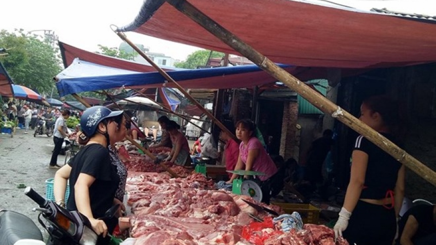 Firms promote pork demand, farmers struggle