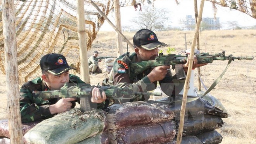 Defence officer observes military exercise in India
