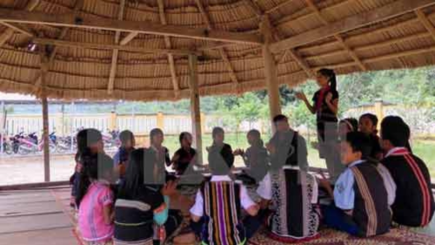 
        Guol communal house, cultural symbol of Co Tu ethnic
                              