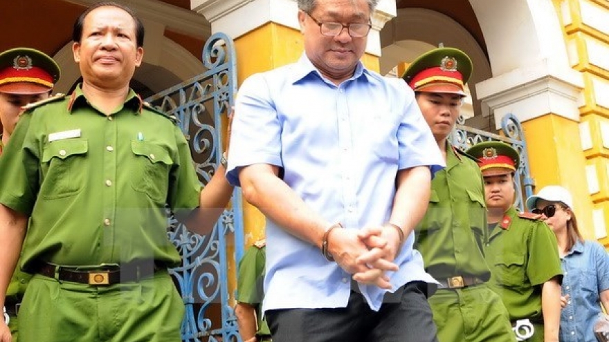 Higher court upholds 30-year jail term for former bank executive