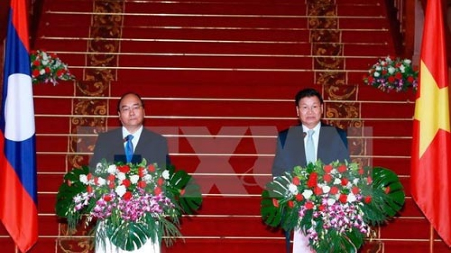Lao PM urges joint efforts to deepen Vietnam-Laos ties