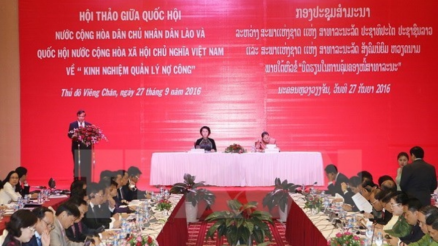 Vietnam, Laos share experience in public debt management