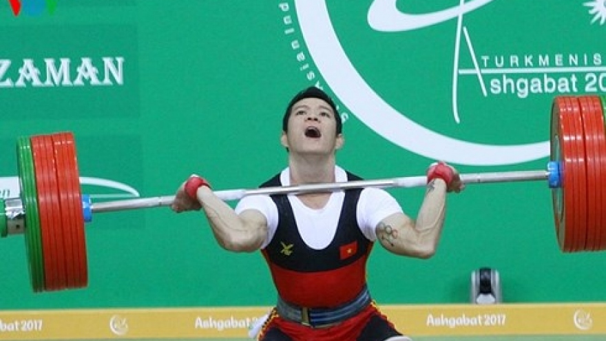 Weightlifter Tuan wins three golds at world champs