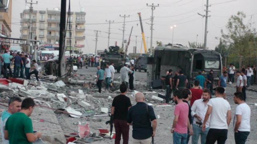 Bomb attacks, cross-border fire kill 13 in southeast Turkey: sources