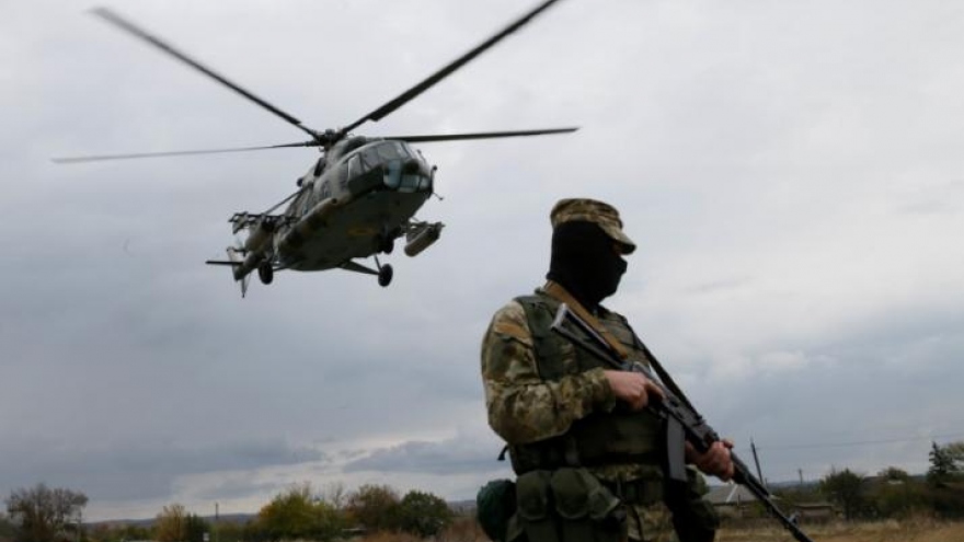 Ukraine military postpones withdrawal from town, cites rebel shelling