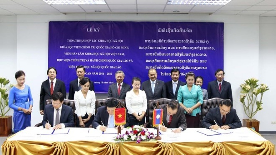 Vietnam, Laos foster cooperation in social science