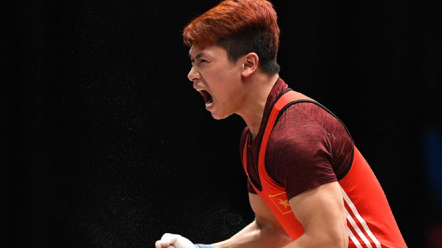 Vinh snatches gold at World Weightlifting Champs